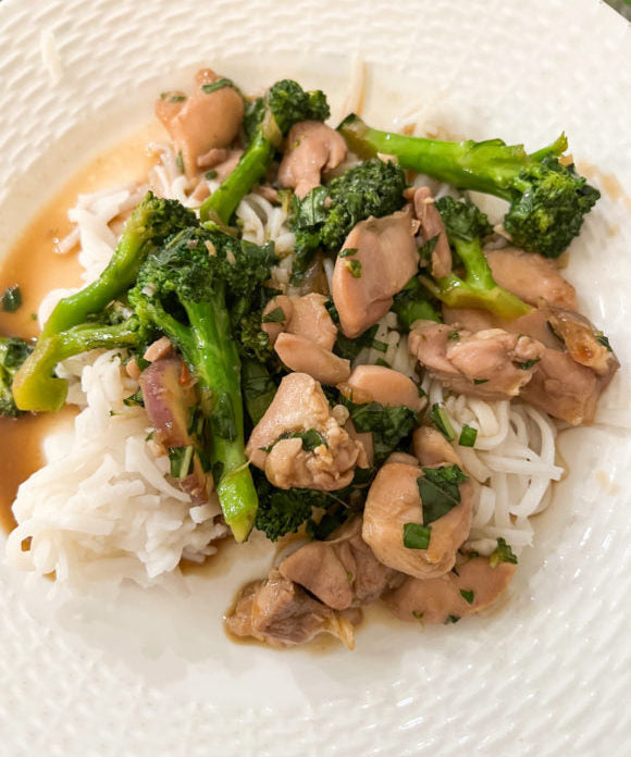basil chicken oon rice noodles with broccoli