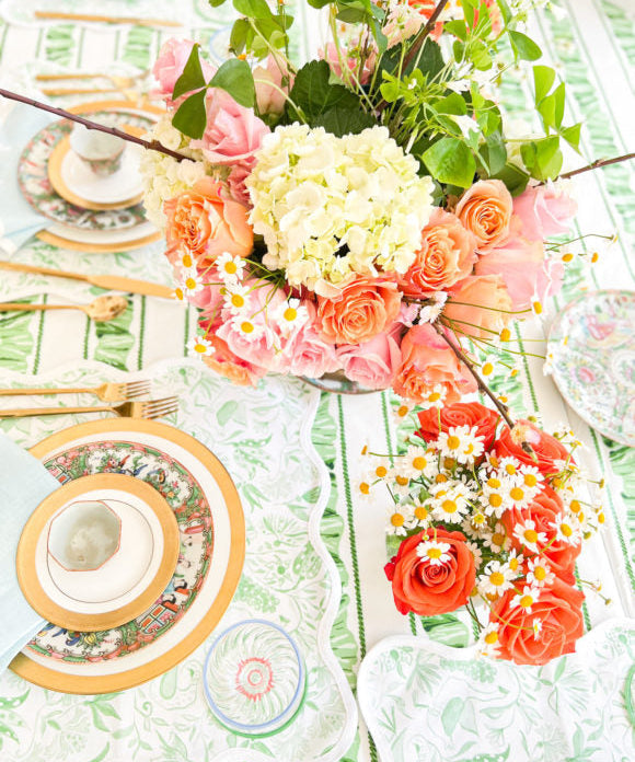 tablesetting with green orange pink and gold