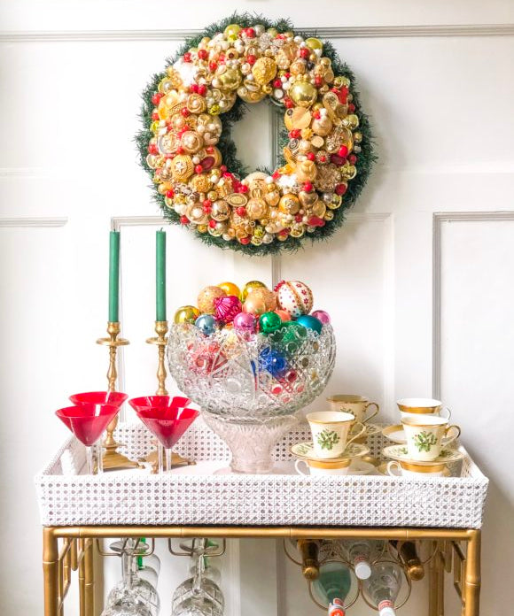vintage jewelry wreath over bar cart parker kennedy living