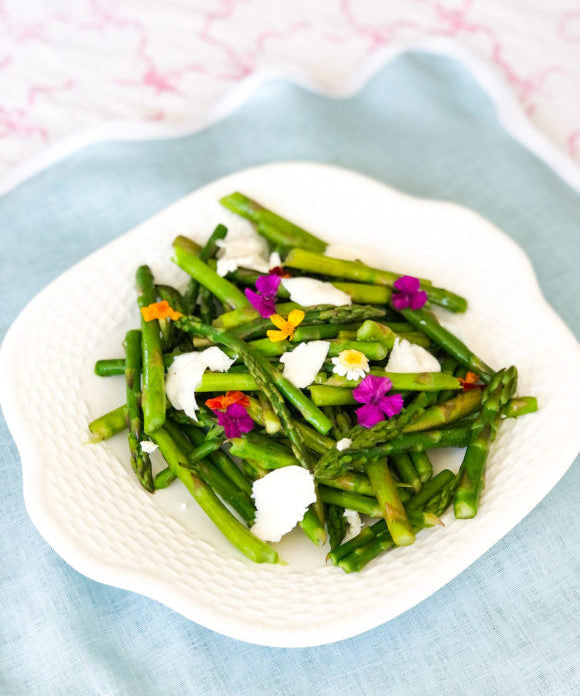 asparagus salad on blue placemat