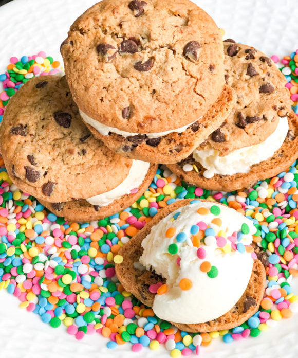 ice cream sandwiches with chocolate chip cookies vanilla ice cream and sprinkles