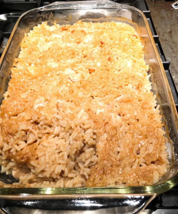 chicken and rice casserole in glass pan