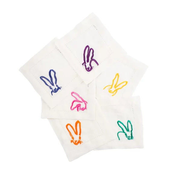 white linen square cocktail napkins with bunnies on them in blue purple pink yellow orange and green