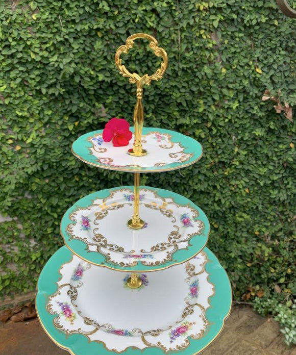 tiered-cake-stand-with-3-plates-gold-rod-flower-ivy-wall