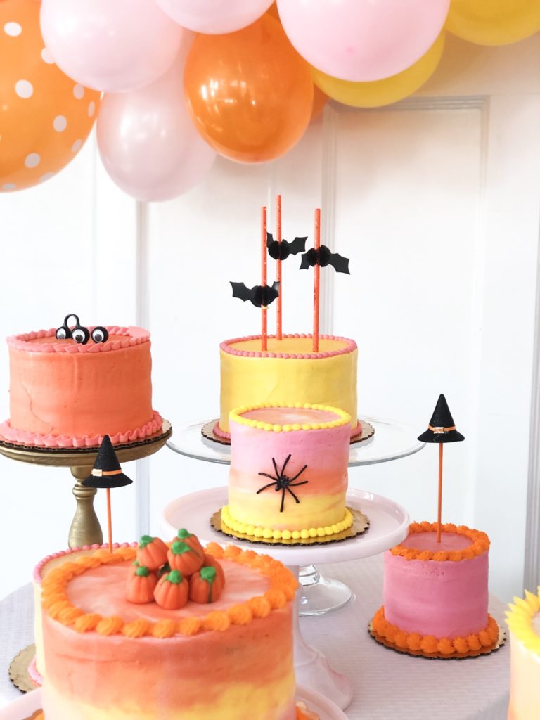 halloween cakes in pink orange yellow
