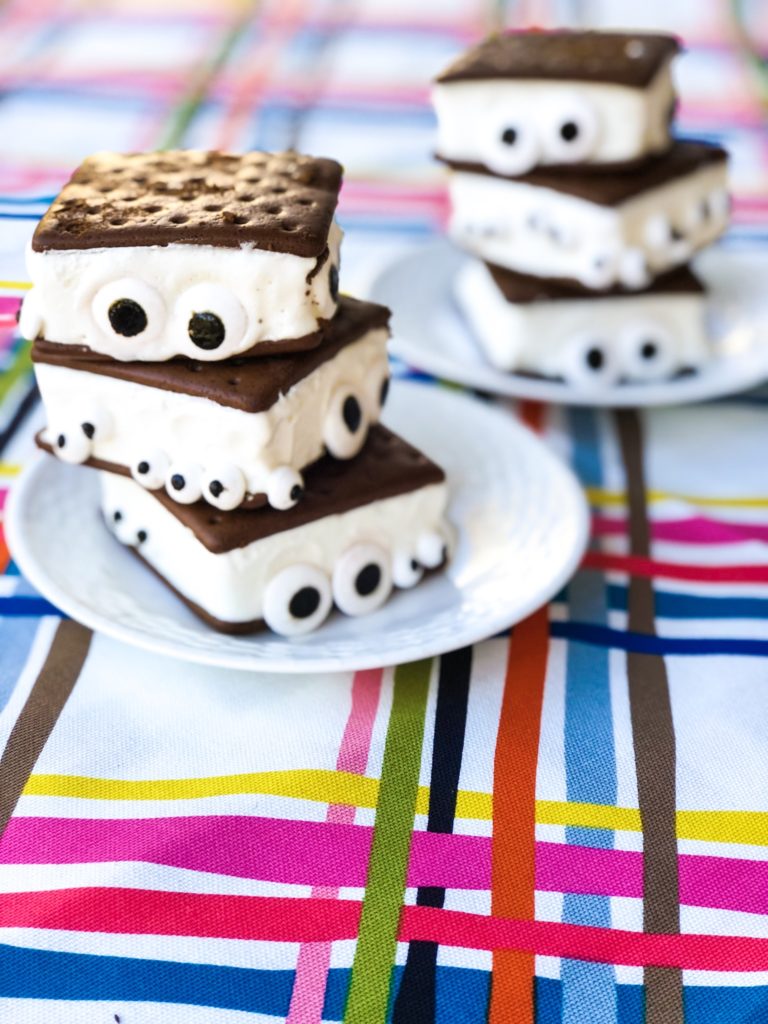 Ice Cream Sandwiches with candy eyes in the ice cream to look like ghosts
