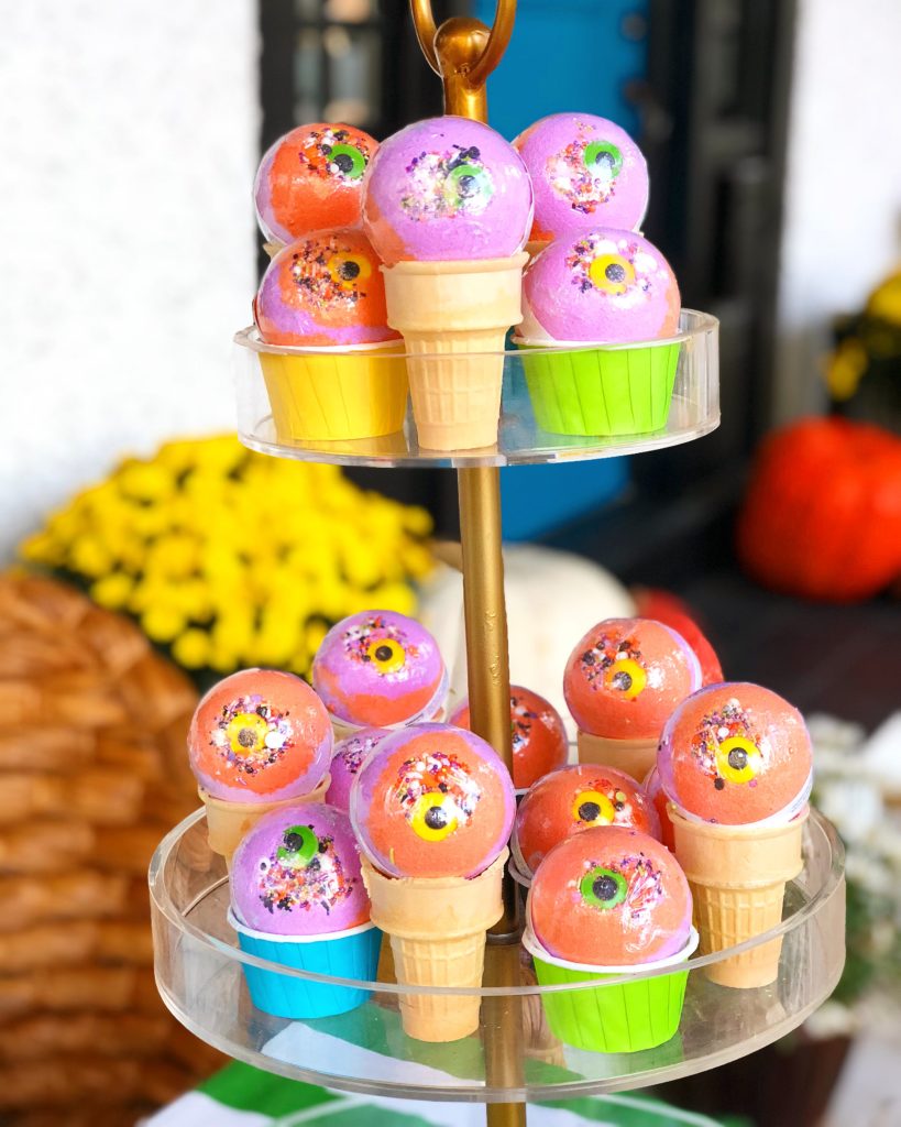 Display of monster mash candy eye bath bombs displayed in ice cream cones