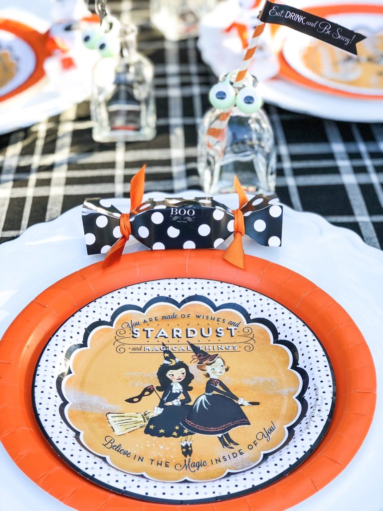 halloween party place setting in orange and black