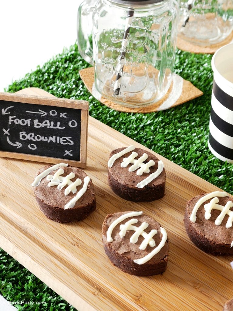 brownies shaped like footballs with white icing for the seams