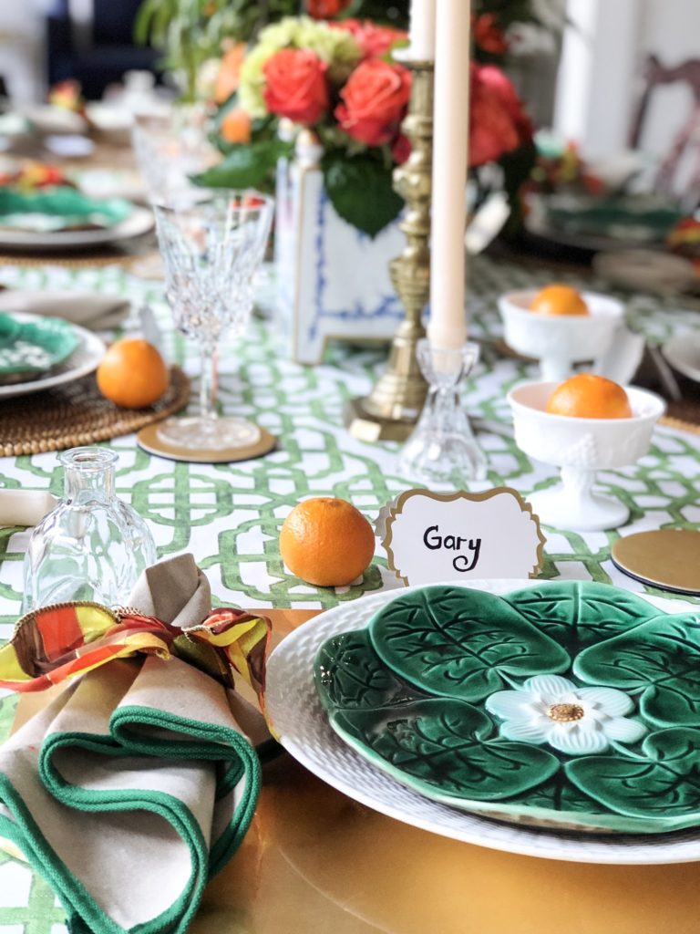 thanksgiving table setting with green and white plates