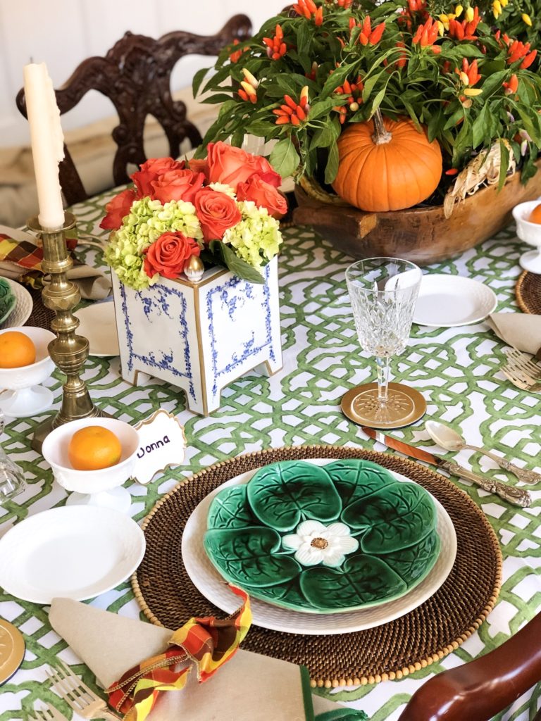Thanksgiving table setting with green white and orange