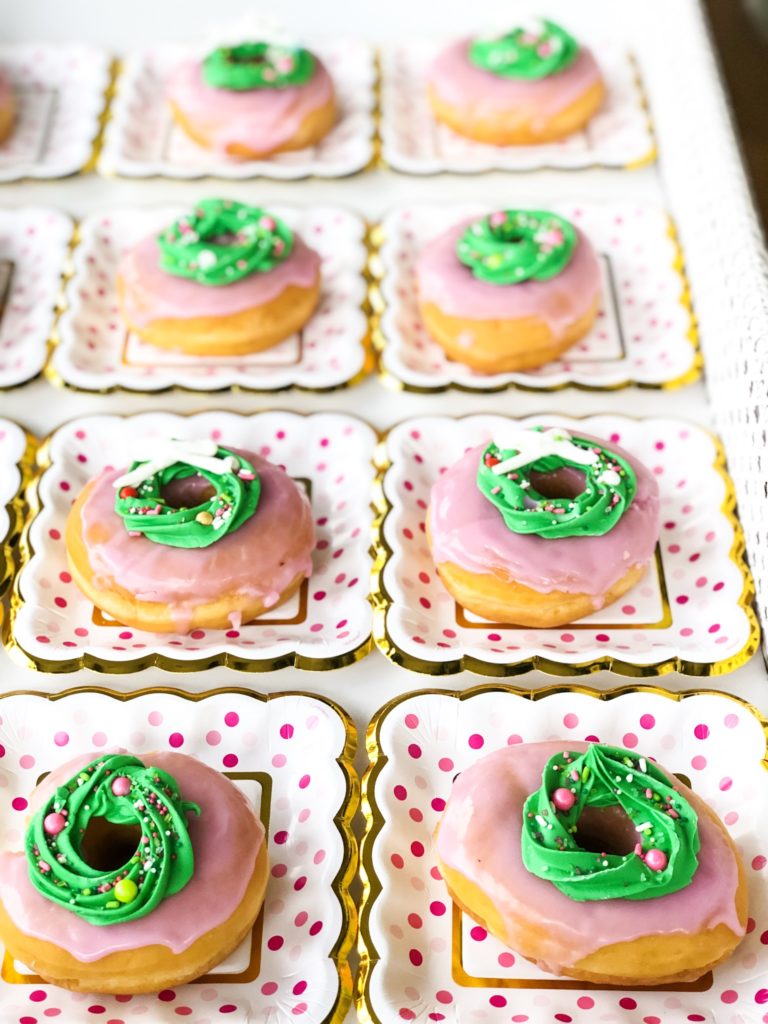 pink doughnuts with green icing wreaths