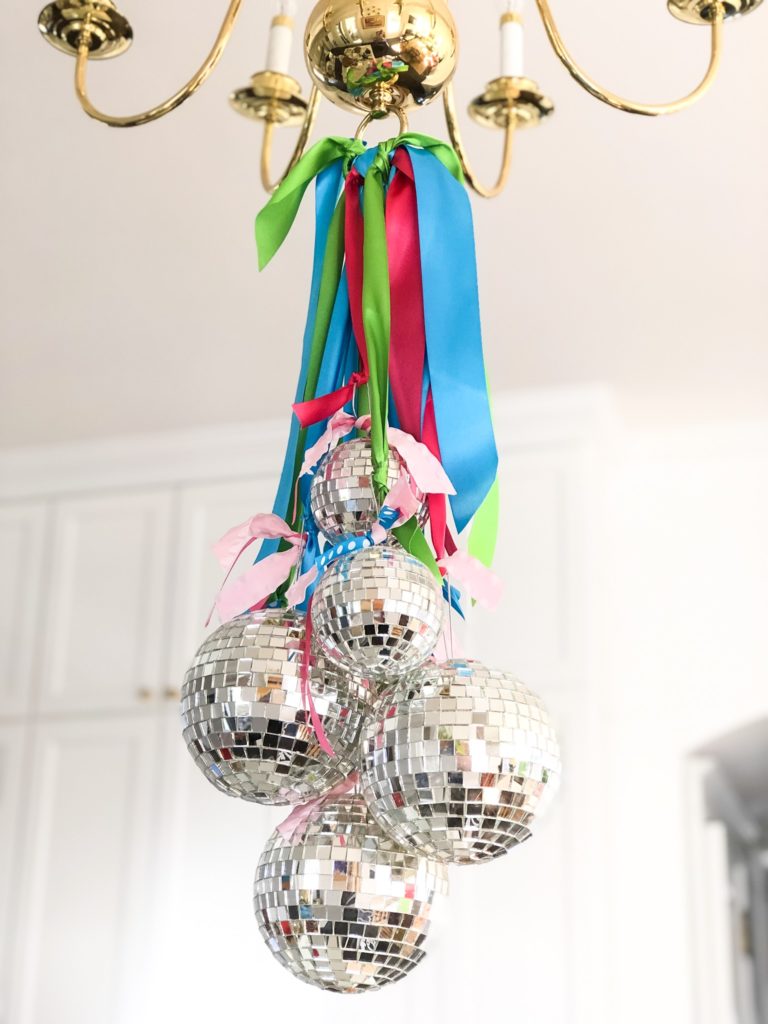 new years eve party ideas disco ball chandelier with ribbon