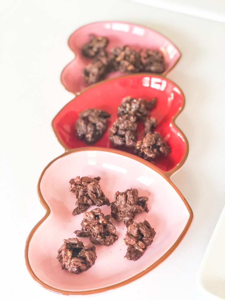 chocolate pecan candy on heart platter
