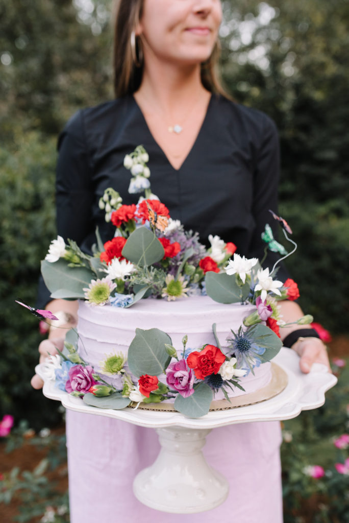 garden party dinner celebration cake with flowers and butterflies