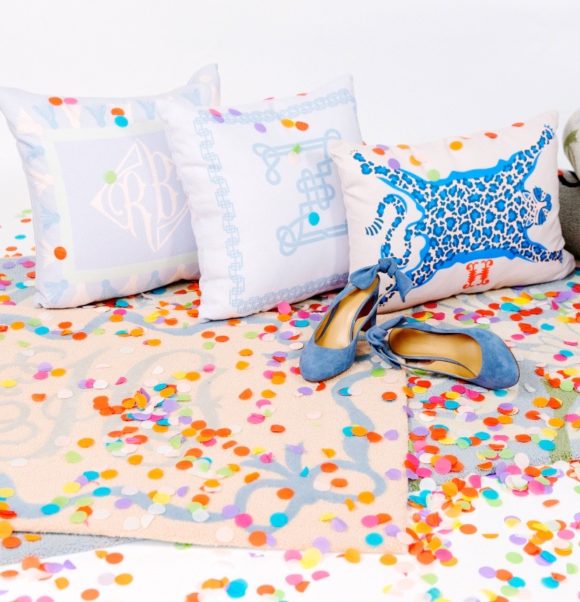 pillows on rugs with blue shoes and confetti scattered everywhere