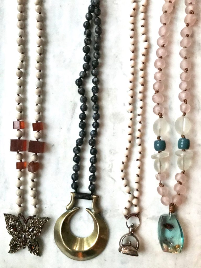cara brown found object necklaces and horse brass necklace