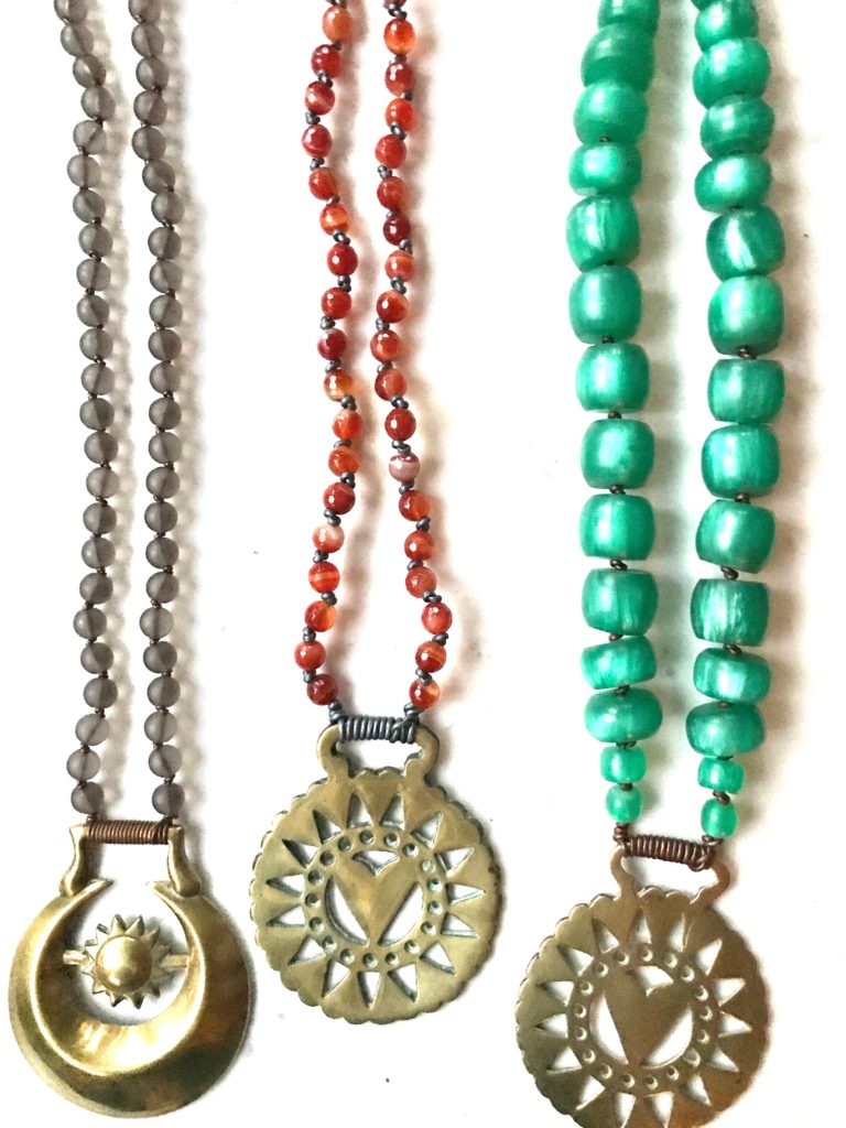 cara brown horse brass necklaces with colored beads in green red gray