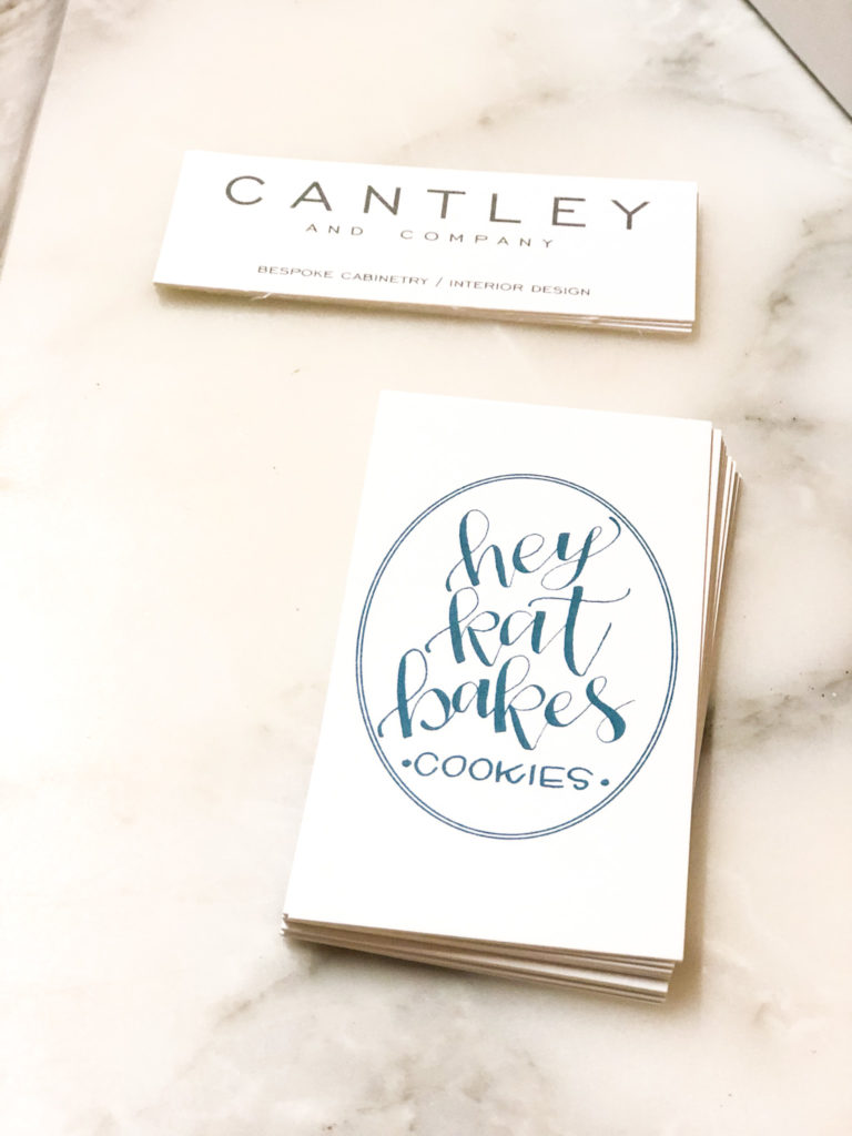 two stacks of business cards with cantley and company and hey kat bakes