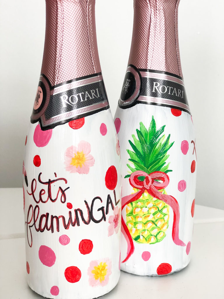 mini champagne bottles hand painted with flamingos and pineapples for galentine's day