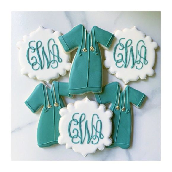 graduation gown cookies and graduates monogram