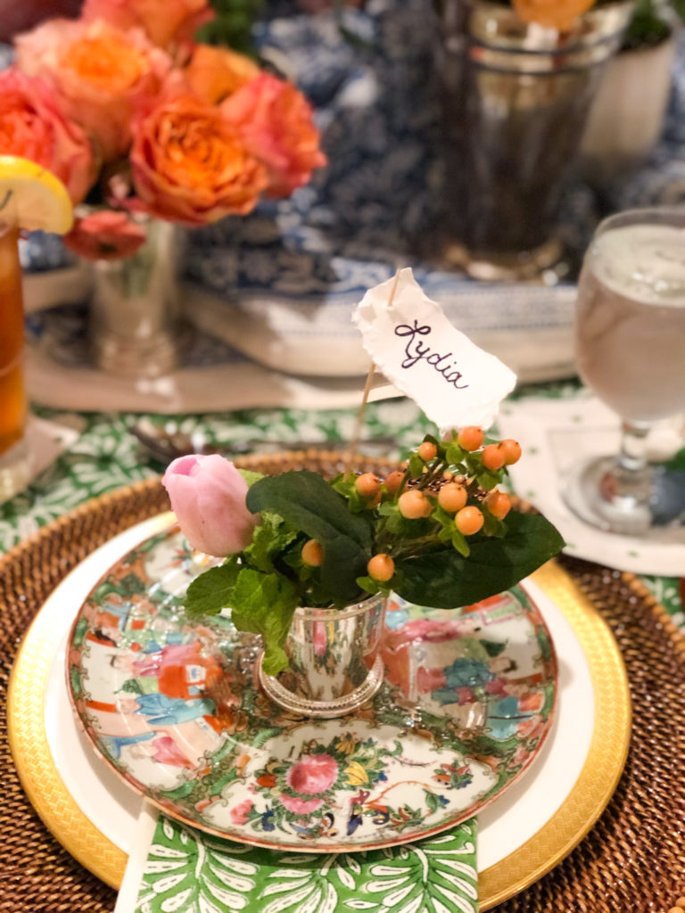 mini mint julep cup on rose medallion plate with flowers