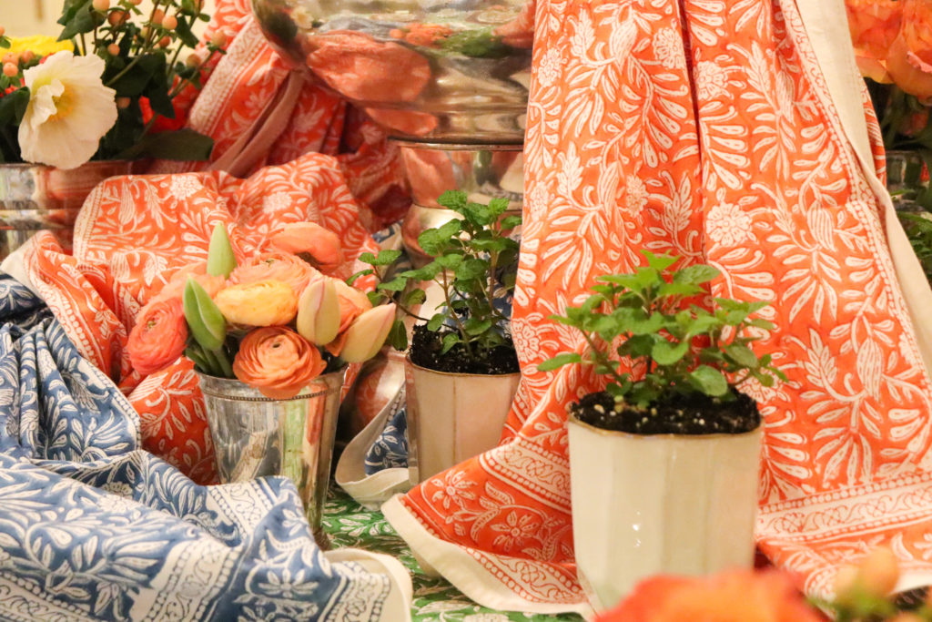 table setting with mint plants and textiles