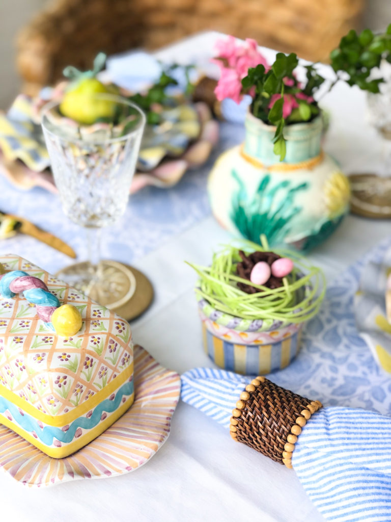 table setting for easter with chocolate bird nests