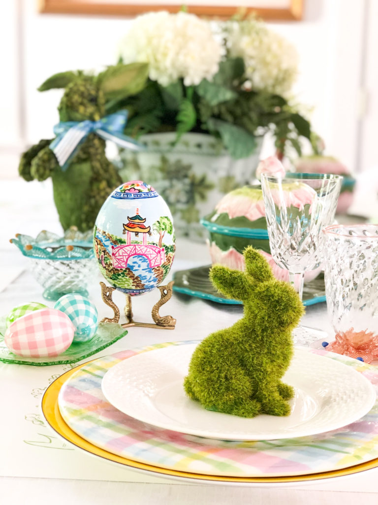easter place setting with moss bunny on top of plates