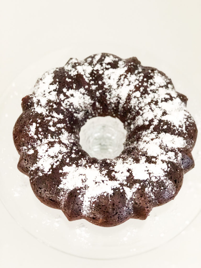 triple chocolate cake with powdered sugar from the top