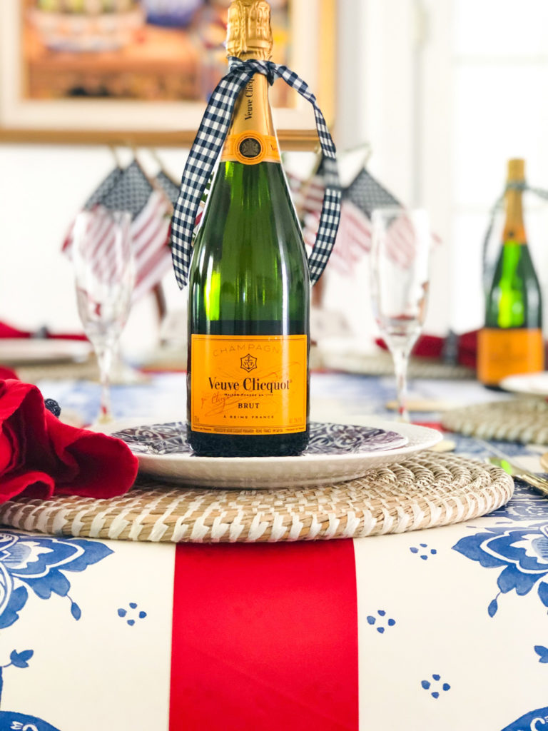 vueve cliquot champagne on red white blue table setting