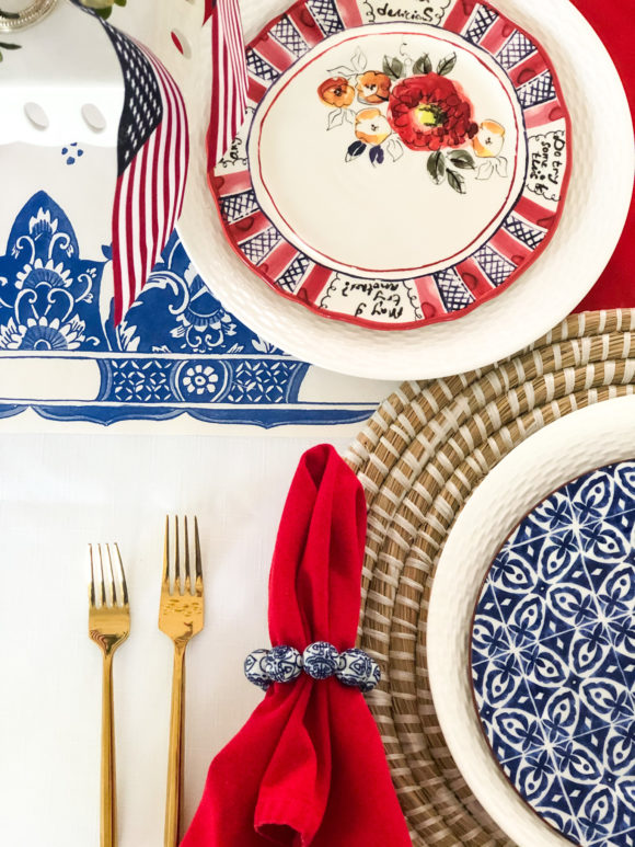 red white and blue table setting with american flag