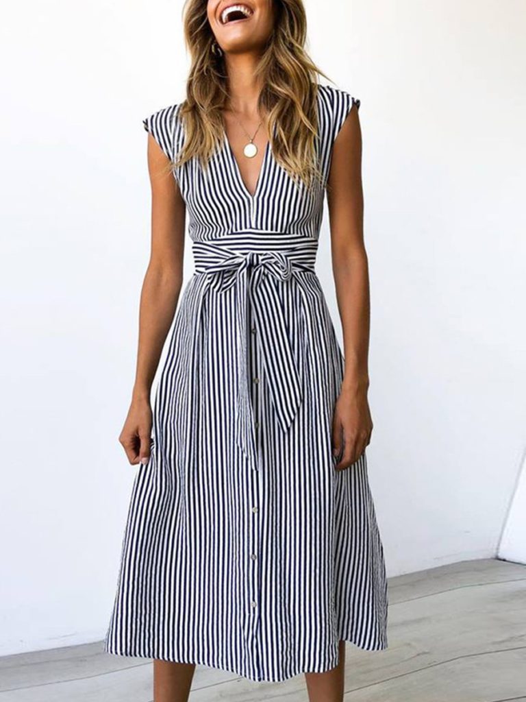 lady with long brown hair wearing blue and white stripe midi dress
