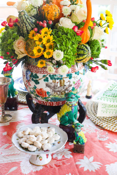 floral centerpiece for fall with foo dogs