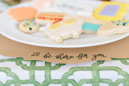close up photo of placemat with i'll be there for you written on it in calligraphy