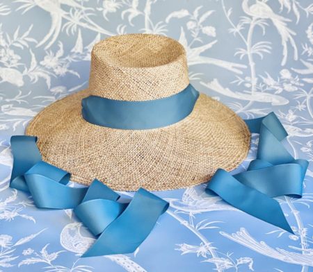 straw hat with blue ribbon