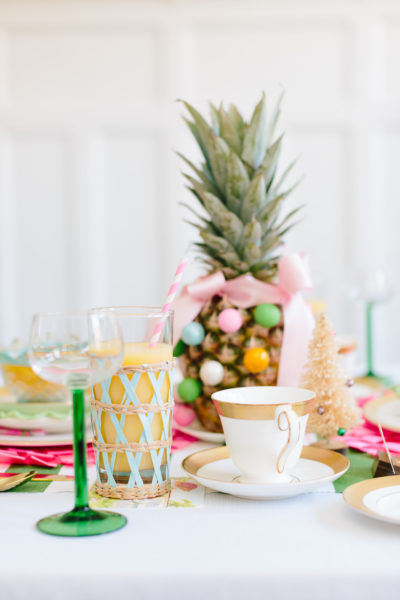 pineapple centerpiece on preppy pink and green table