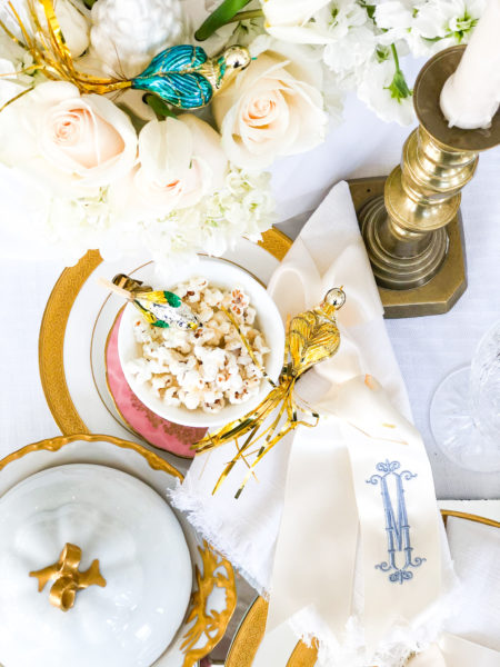 winter table setting with popcorn and bird