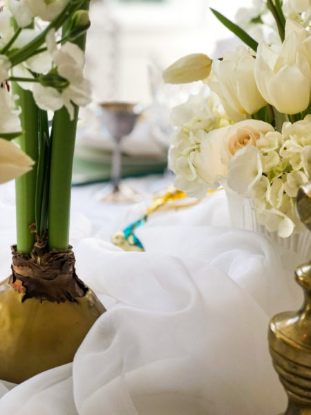 sheer fabric on center of table with flowers