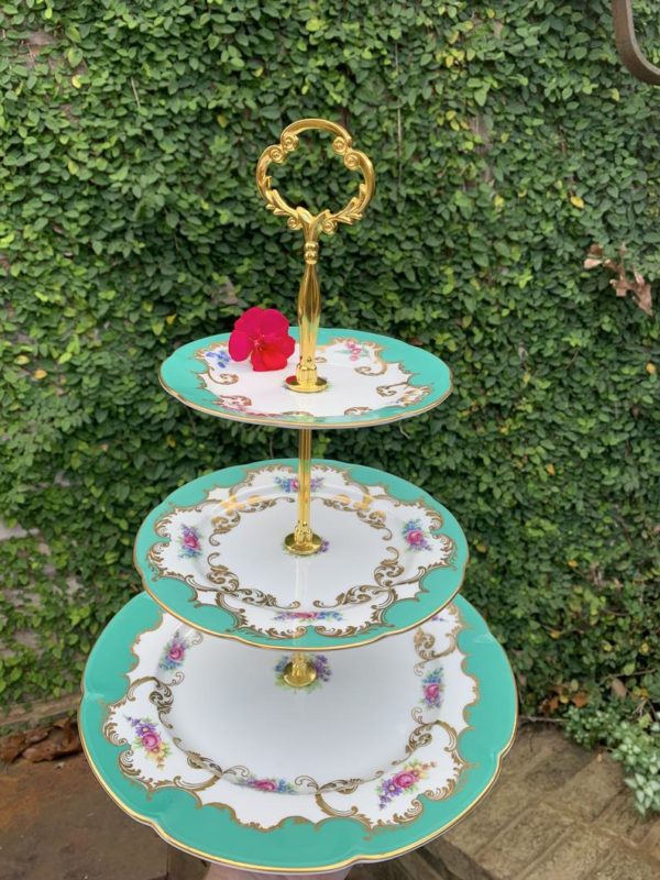 tiered-cake-stand-with-3-plates-gold-rod-flower-ivy-wall