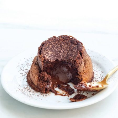 dark chocolate lava cake on white plate