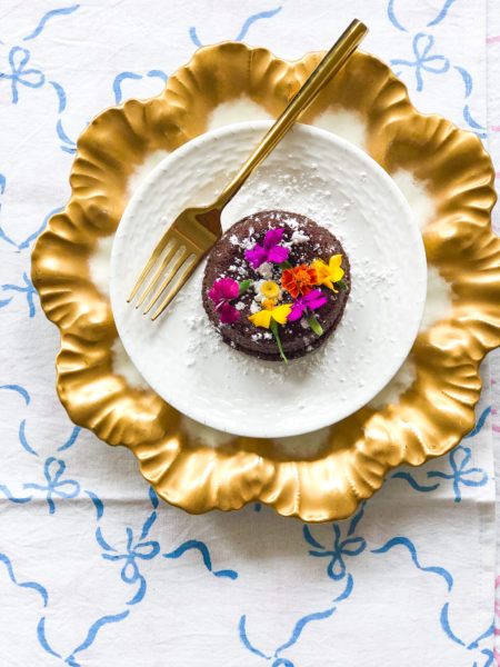 bake from scratch lava cakes on gold plate with edible flowers