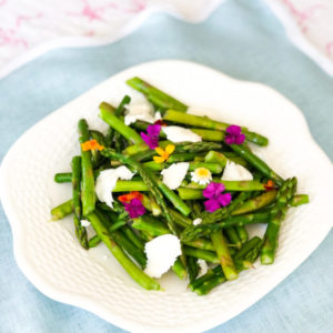 asparagus salad on blue placemat