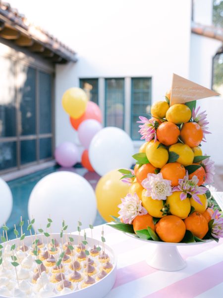 citrus party topiary cake with balloons