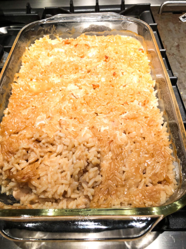 chicken and rice casserole in glass pan