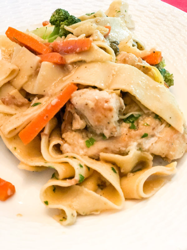 chicken piccata with egg noodles carrots and broccoli