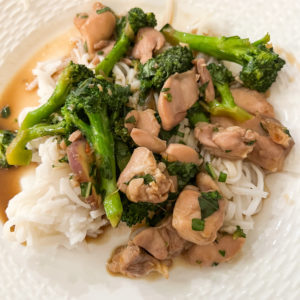 basil chicken oon rice noodles with broccoli