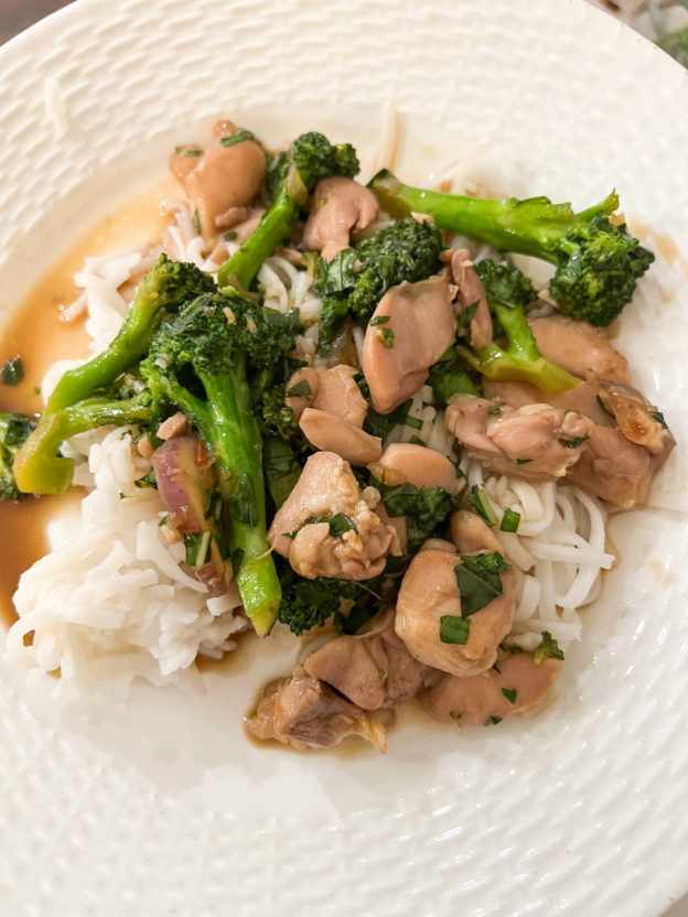 basil chicken oon rice noodles with broccoli