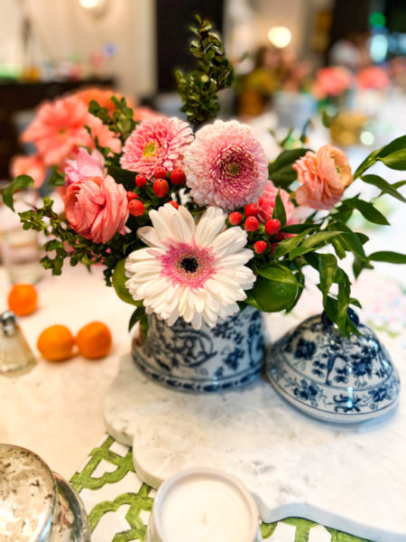 flower arrangement in blue and white container