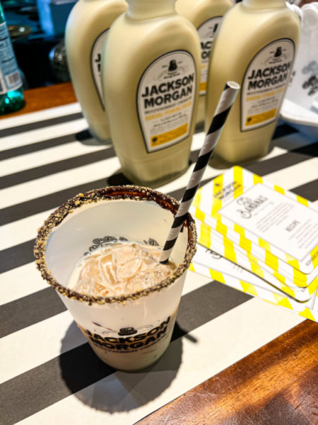 jackson morgan cream drink in a cup with striped straw